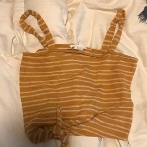 Orange and white striped crop top tank.